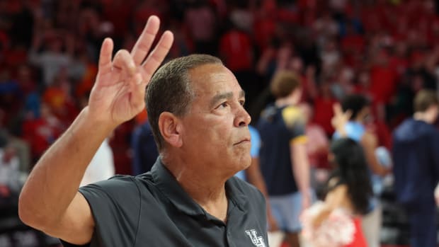 Nov 26, 2022; Houston, Texas, USA; Houston Cougars head coach Kelvin Sampson stands for the school song after defeating the Kent State Golden Flashes at the Fertitta Center. Mandatory Credit: Thomas Shea-USA TODAY Sports